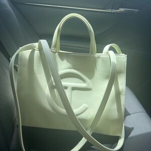 Hardly used Telfar bag, comes in duster. I have receipt proof as well.